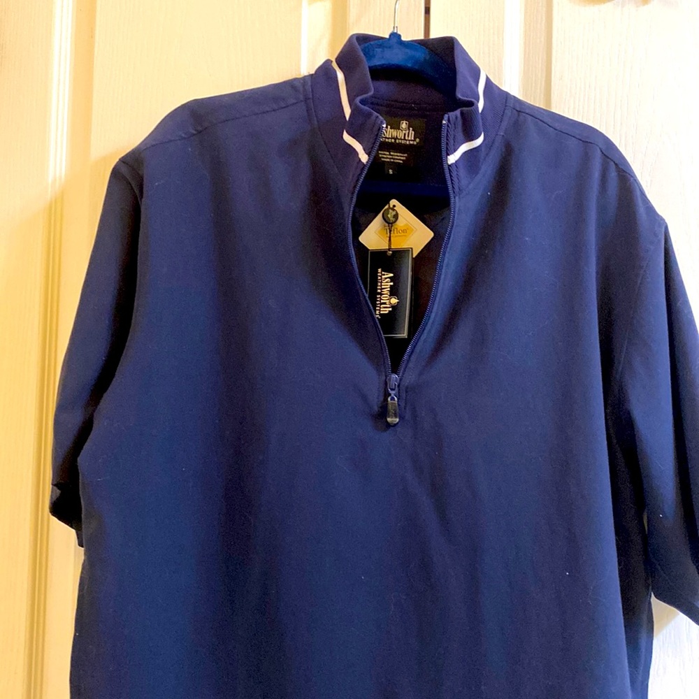 Ashworth weather systems short sleeve weather resistant navy shirt w drawstring.